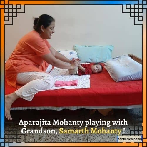 Aparajita playing with her grandson